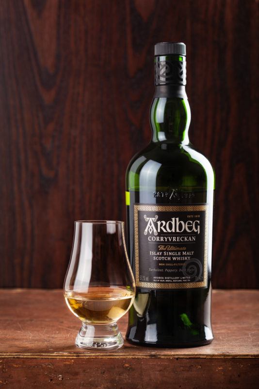 Ardbeg Corryvreckan on dark background with whisky snifter