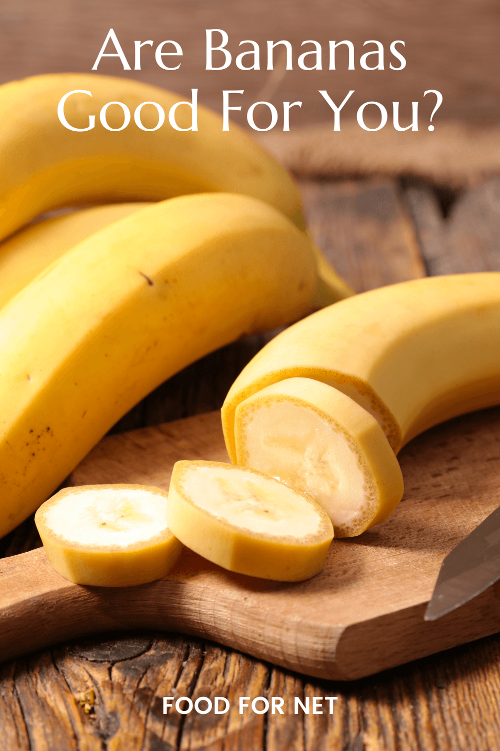 Are Bananas Good For You? A couple of bananas on a table, along with one that has been sliced into pieces