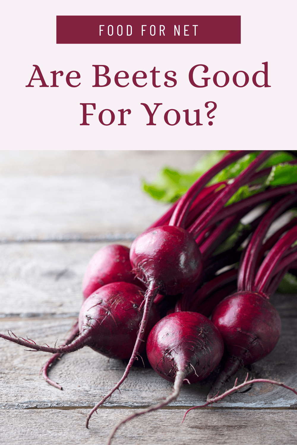 Fresh beets with their stalks on a table, highlighting the question of whether beets are good for you