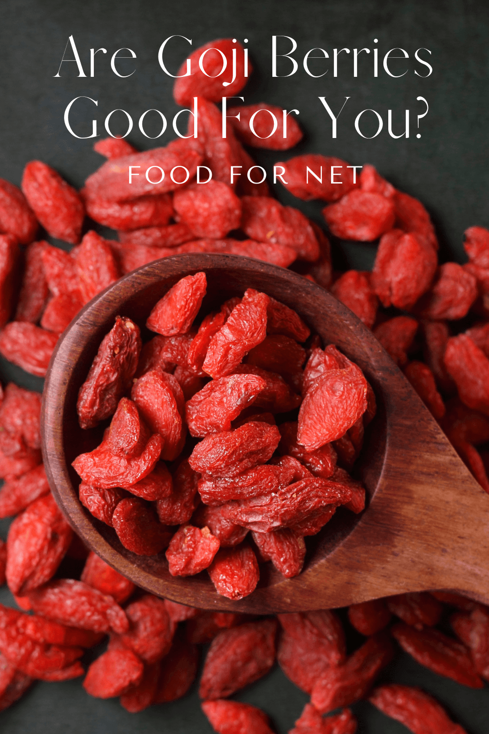 A large spoon of dried goji berries with a pile of goji berries underneath, looking at whether goji berries are good for you