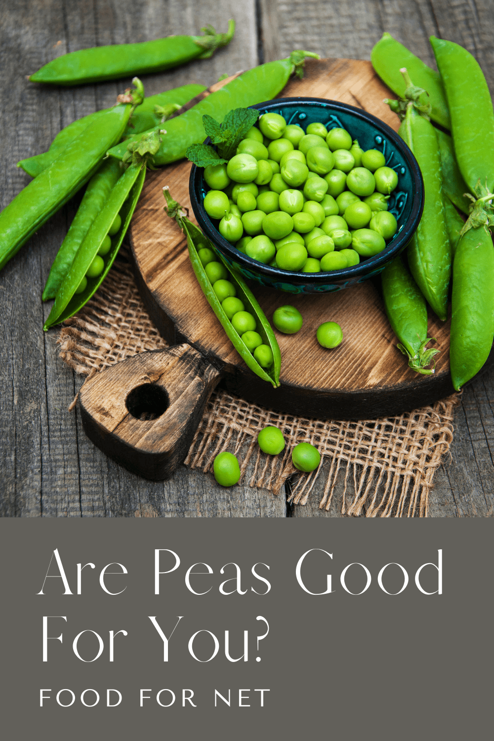 A wooden board with fresh peas in their shells and a black bowl containing unshelled fresh green peas, looking at whether the peas are good for you