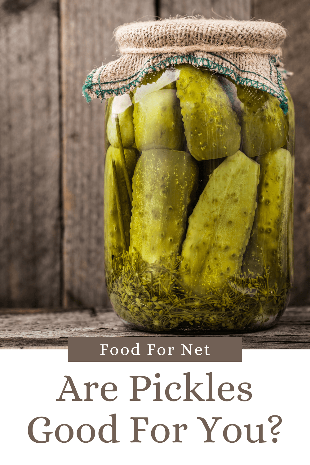 A jar of pickles with a brown cloth top, looking at whether pickles are good for you