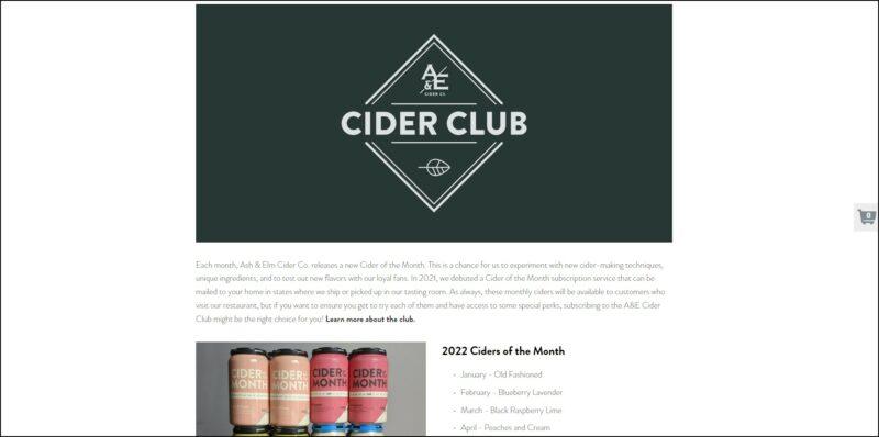 screenshot of Ash & Elm Cider Co. Cider of the Month's web page, mainly white page with a block banner in dark green color bearing the website's logo and an overlay text 