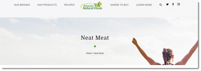 A website screenshot from the Atlantic Natural Foods site with a happy woman