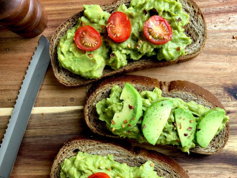 Smashed avocado on pieces of toast