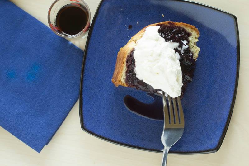 baba-rhum-rum-poached-cherries-chantilly-cream-top-down-detail-shot-rum