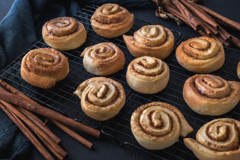 A selection of cinnamon rolls on a tray