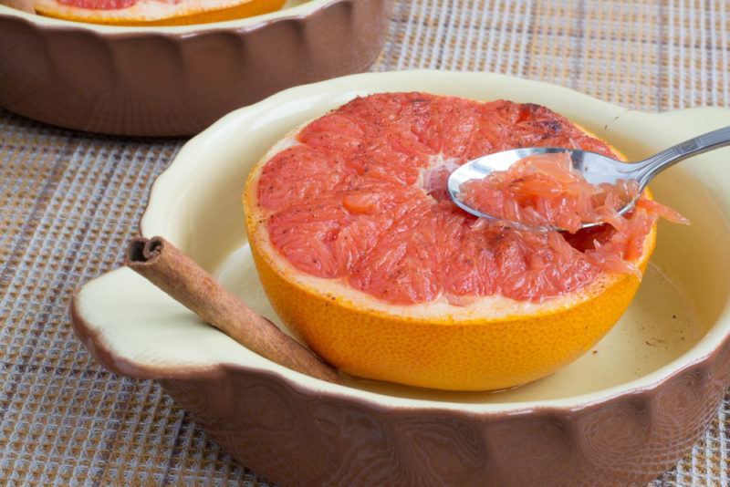 A baked grapefruit with cinnamon and sugar