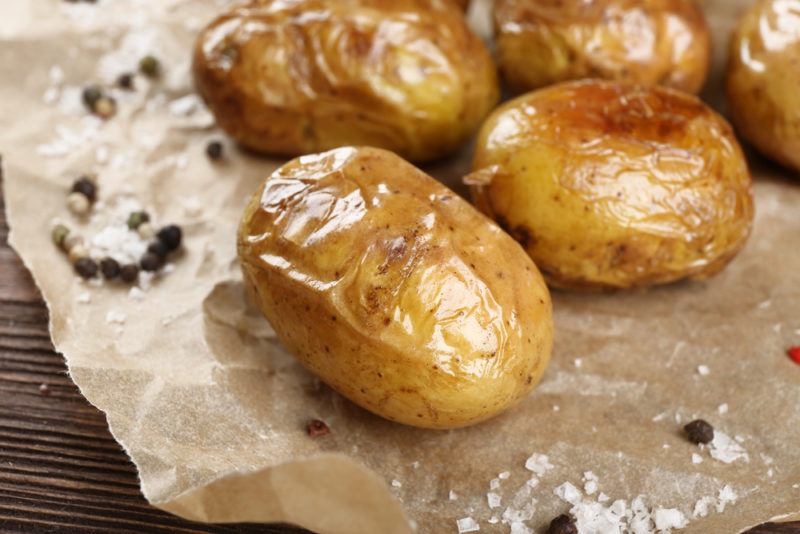 A selection of baked potatoes with salt