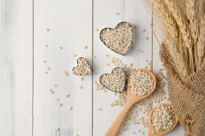 Three love heart bowls and a spoon of barley