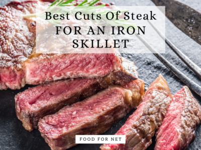 A sliced piece of rare steak on a serving board, looking at the best cuts of steak for an iron skillet