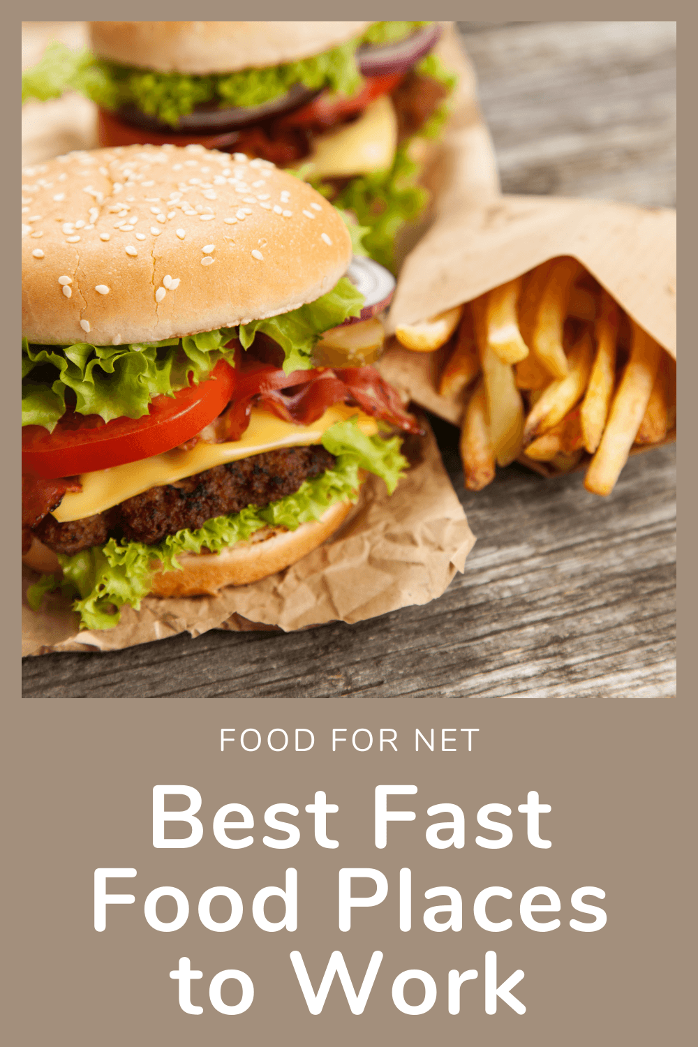 Two burgers and a small paper bag of fries on a wooden table