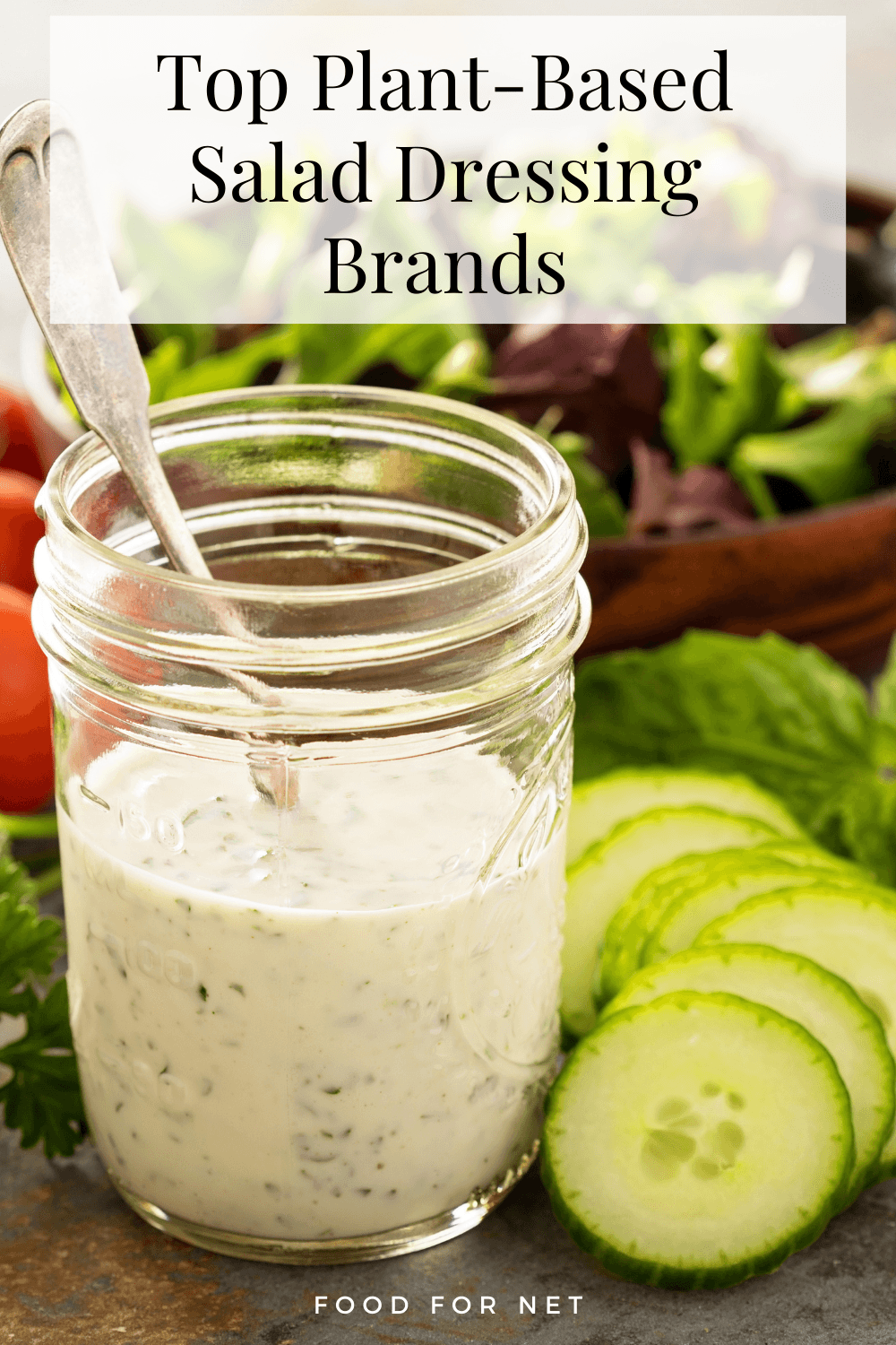 Plant-Based Salad Dressing Brands. A jar of salad dressing next to sliced cucumber, looking at the best plant-based salad dressings