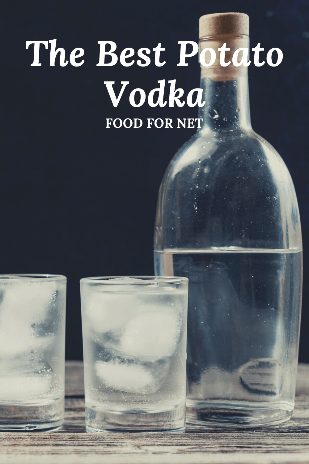 A bottle of potato vodka next to two glasses against a black background