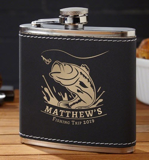 Big-Catch-Flask | Food For Net Black leather flask with a copper fish and text.