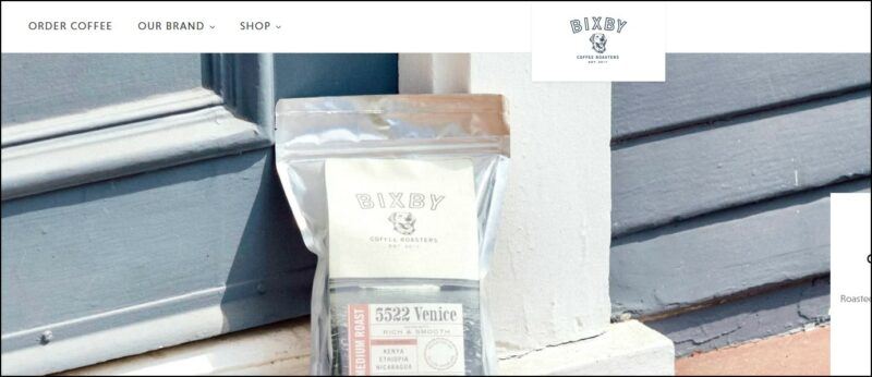 screenshot of Bixby Medium Team K-cup Subscription's web page, white header with the website's logo/name and the main menu, the page is displaying an editorial image of the coffee beans in pouch with text overlay.