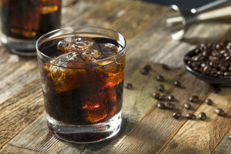 A black Russian cocktail in a glass with ice