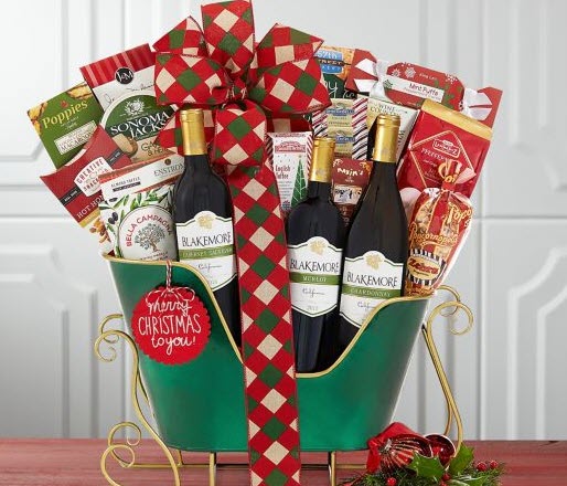 Blackmore Winery Holiday Sleigh | Food For Net Green sleigh with wine and snacks