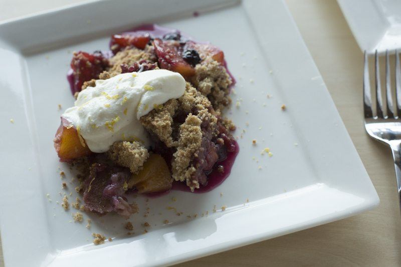 Blueberry Peach Crumble Vanilla Bean Whipped Ricotta Detail Two Plates Angle Square Fork