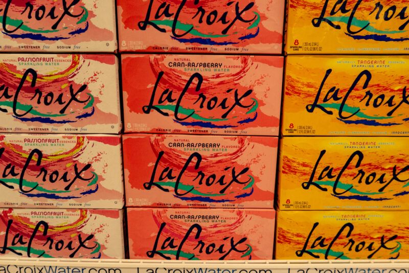 Boxes of La Croix sparkling water in a grocery store