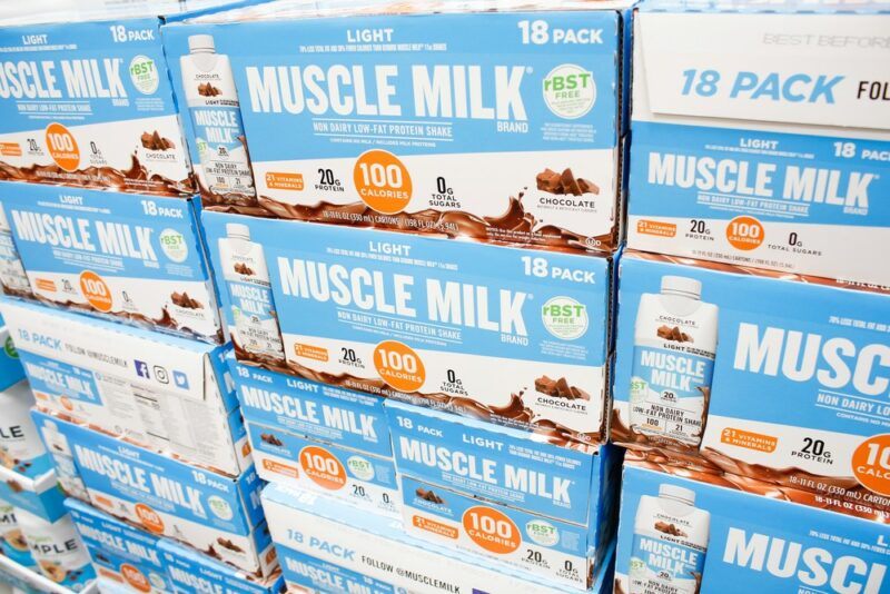 Blue and white boxes of Muscle Milk in the grocery store