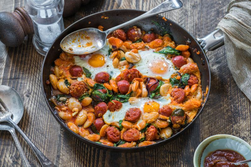 A breakfast bake with eggs, sausage and beans