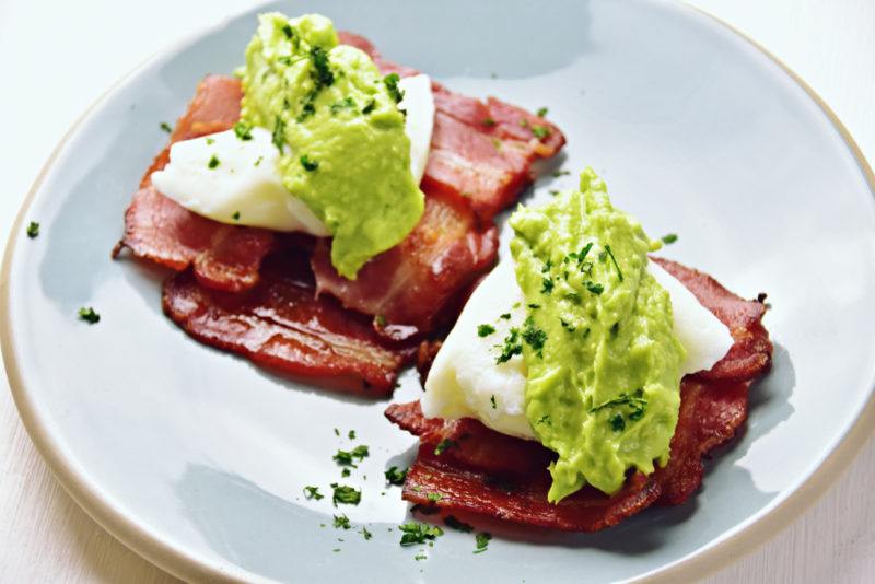 A breakfast hash using bacon, egg, and avocado