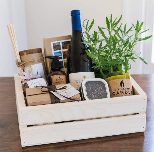 Calle Elegante Rusack Chardonnay Gift Crate | Food For Net Crate containing white wine, a plant and artisinal goodies