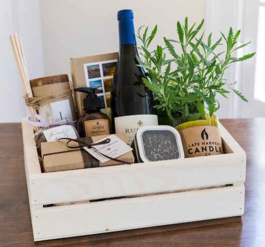 Calle Elegante Rusack Chardonnay Gift Crate | Food For Net Light wooden box with wine, a candle and a plant