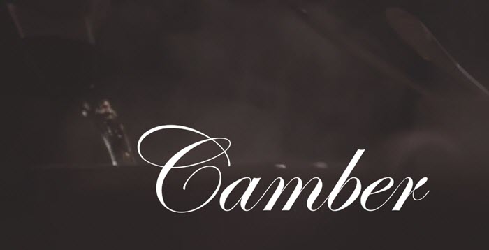 A background image of coffee being poured with Camber text