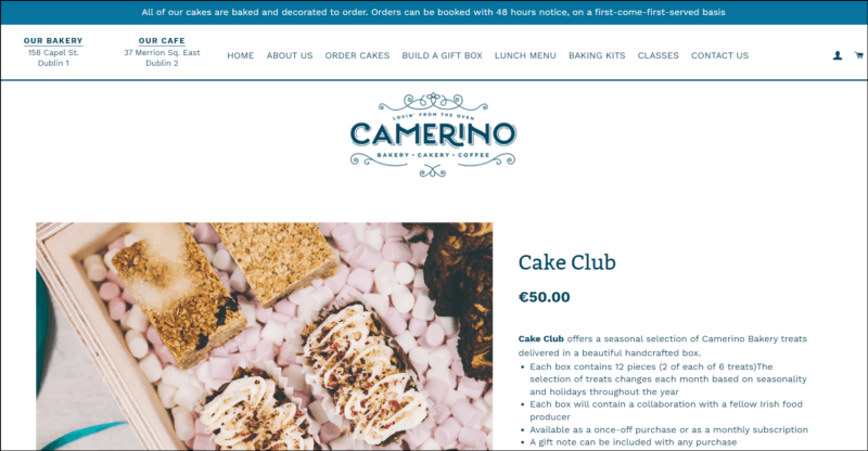 screenshot of Camerino Cake Club's web page, dominantly white with blue announcement bar on top followed by the main navigational menu, underneath it is the website's logo/name, and then the details of the club subscription alongside an image of different cakes cut into little rectangles on paper liners