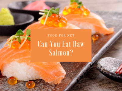 Three pieces of sushi made with raw salmon and fish eggs, highlighting the question of - can you eat raw salmon?