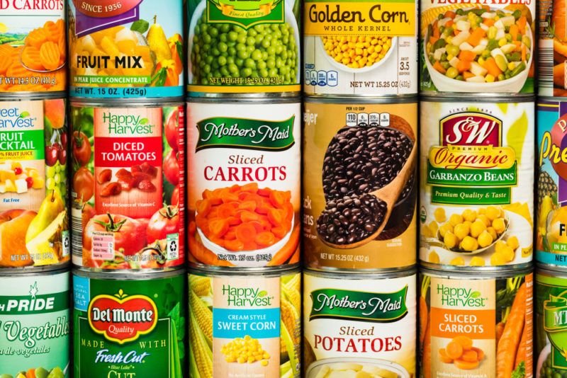 Stacked cans of food from a grocery store