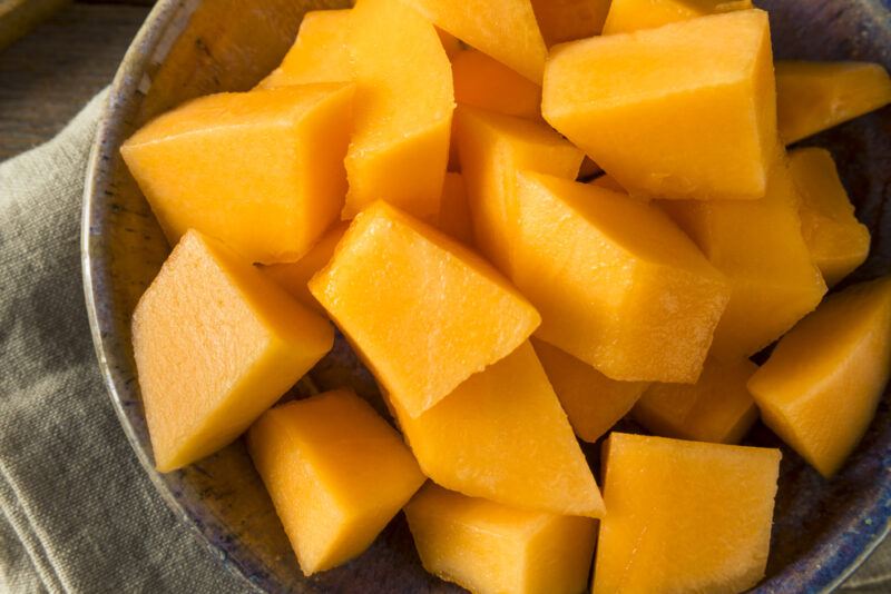 Raw,Organic,Tuscan,Melon,Cantaloupe,Cut,Into,Pieces | Food For Net This photo shows an overhead view of several pieces of cut cantaloupe.