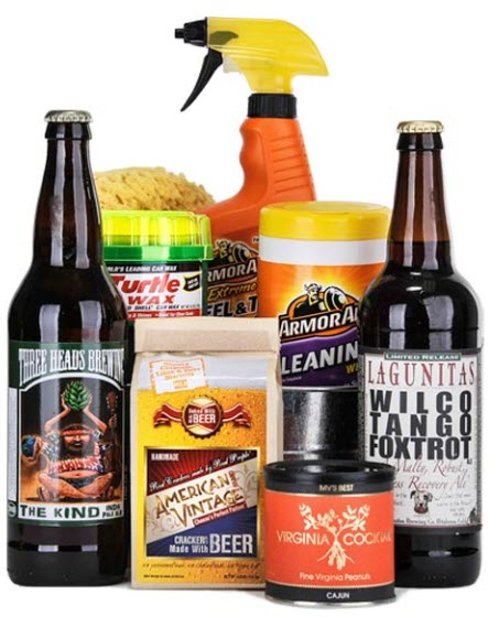 A selection of car wash products, beer and snacks against a white background. 