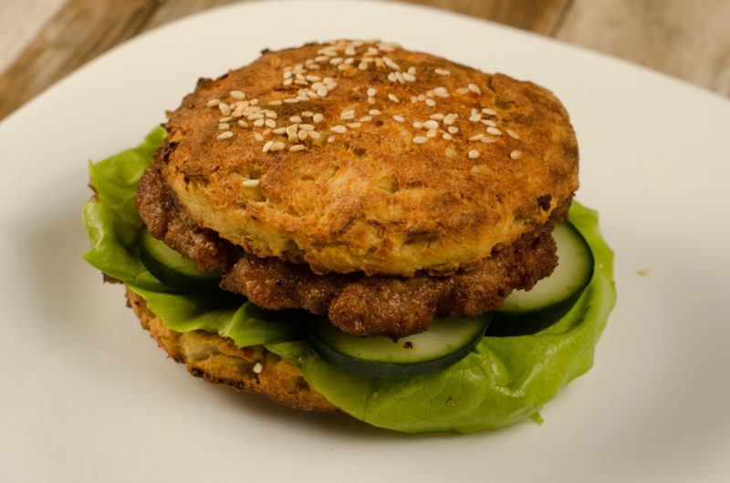 A burger made using cauliflower burger buns