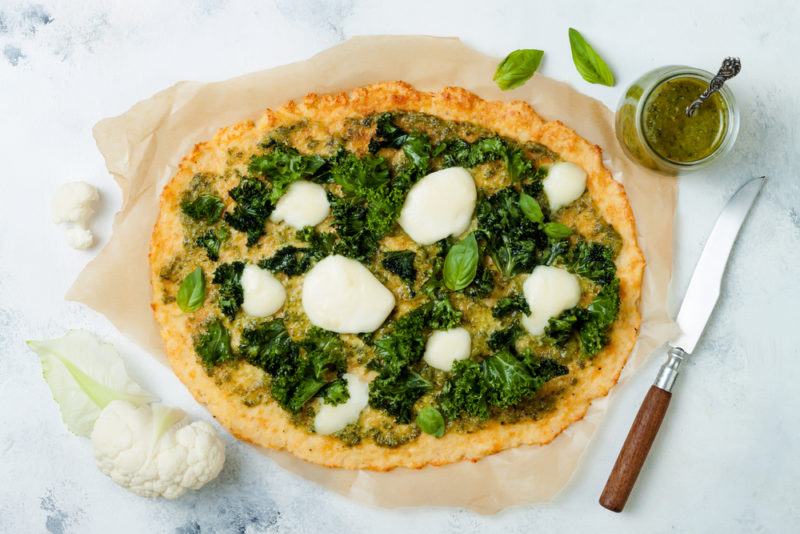 Cauliflower pizza crust with broccoli and cheese