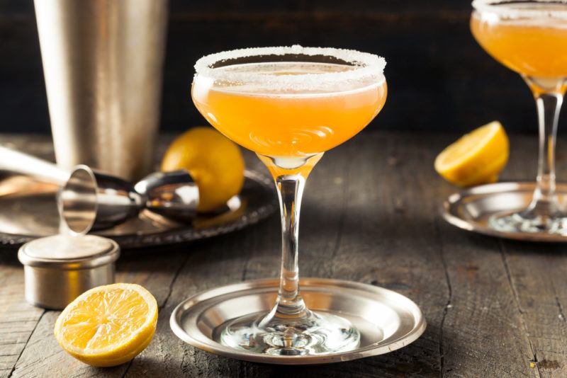 A champagne sidecar cocktail with a second in the background