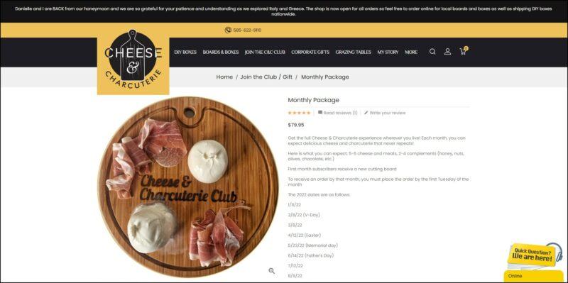 screenshot of Cheese & Charcuterie Monthly Package's web page, mainly white page with a black announcement bar on top followed by a yellow banner bearing the website's logo, underneath it is a black banner bearing the main menu, the page shows the details of the subscription plan accompanied by a an image of the sample cheese and charcuterie package.