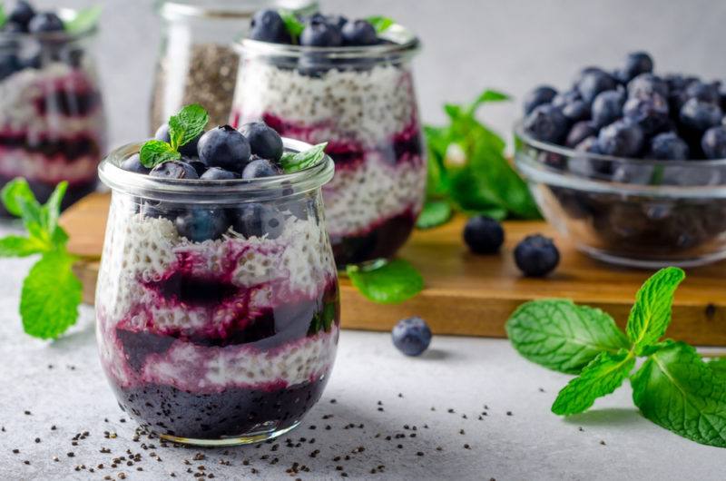 Two layered chia seed puddings with blueberries