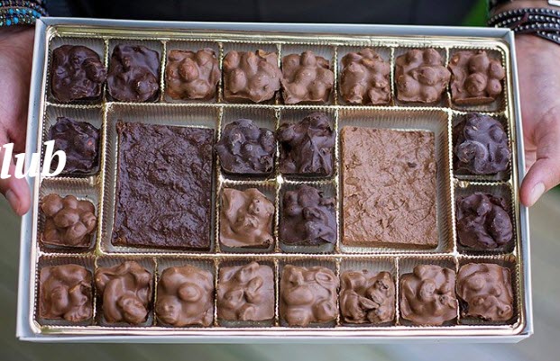 A tray with various hand dipped chocolates