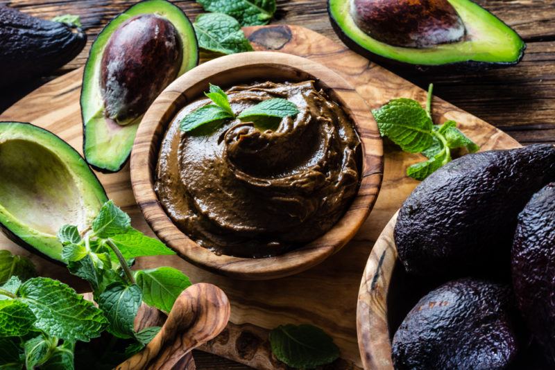 A brown bowl of chocolate mousse