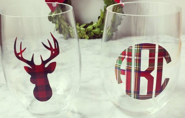 Christmas Clear Wine Glass | Food For Net Two wine glasses, one with a deer head and the other with a logo