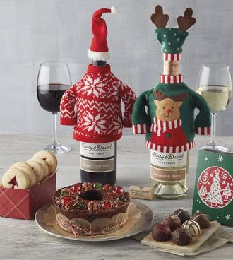 Christmas Sweater Wine Gift | Food For Net Two bottles of wine in sweaters with snacks