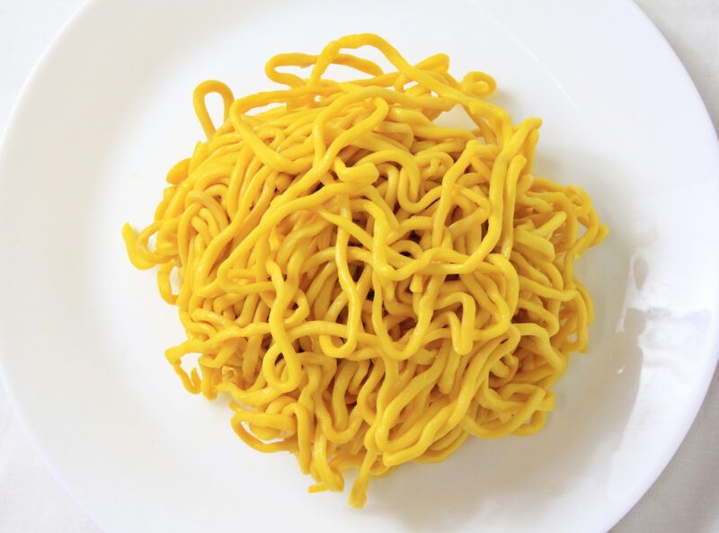 overhead shot of a white plate with plain chukamen noodles