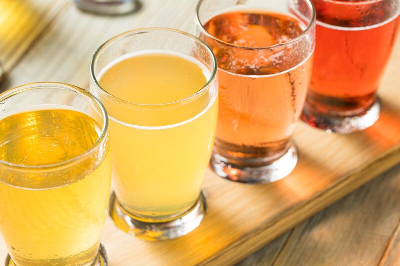 Hard cider of the month club.  A flight of 4 ciders on a wooden plank