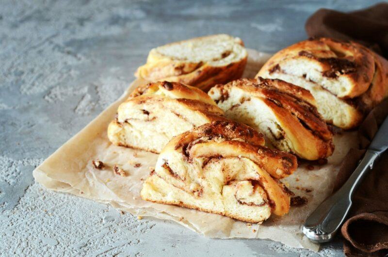 Sliced pieces of cinnamon pull apart bread on a table