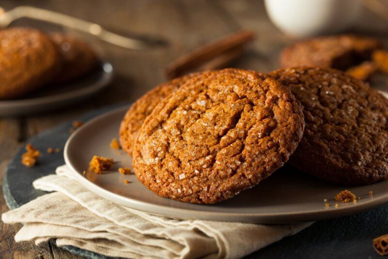 Two plates with coffee cake cookies on a wooden table