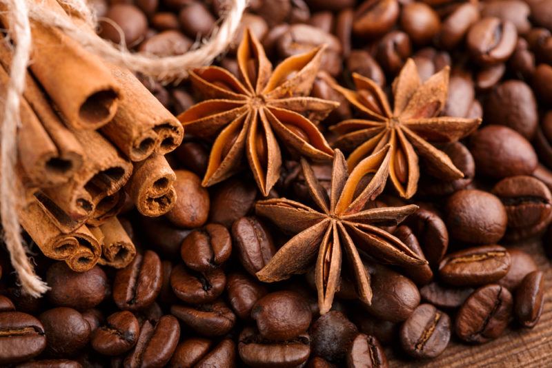 Star anise and cinnamon on coffee beans