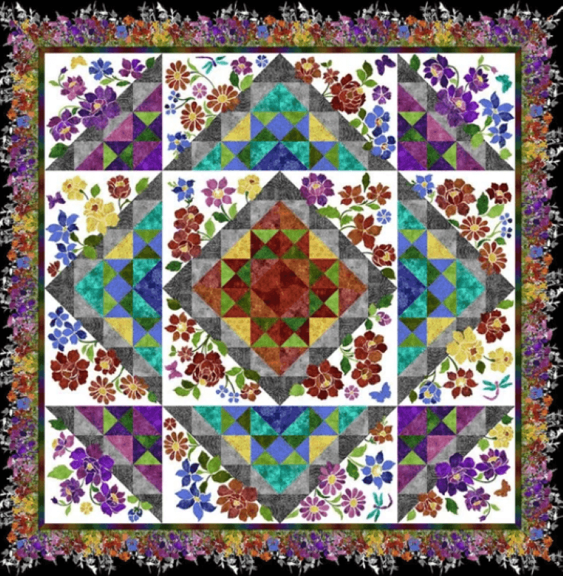 Vibrant laser quilt with blocks with shapes and flowers